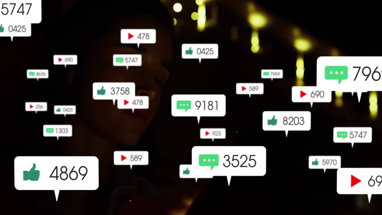 Animation of social media icons floating over dimly lit background with lights