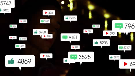 animation of social media icons floating over dimly lit background with lights