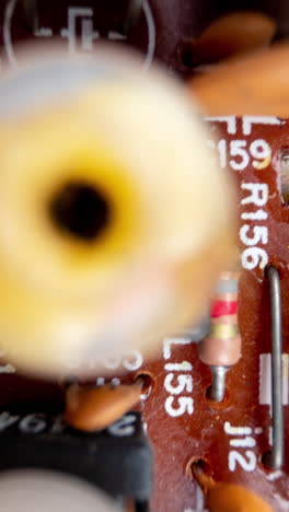 A-macro-shot-of-a-circuit-board-in-vertical