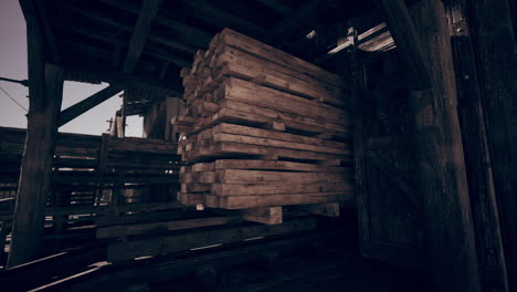 stacked wooden planks in a lumberyard