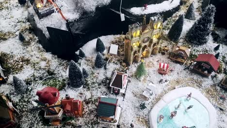 picturesque snowy christmas model toy town aerial view above scenic display dolly right