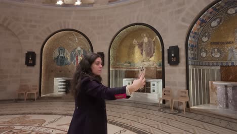 woman taking selfie in a beautiful church
