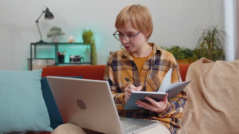 girl making online conference video call talking to laptop webcam elearning in remote chat at home