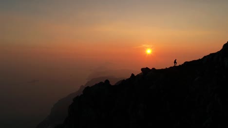 hiker on top of the mountains