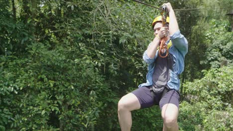 man enjoying on ziplining at adventure park