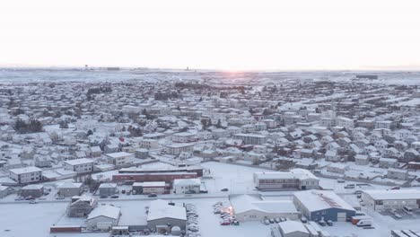 stunning bright sundown at arctic iceland town of reykjanesbær, aerial