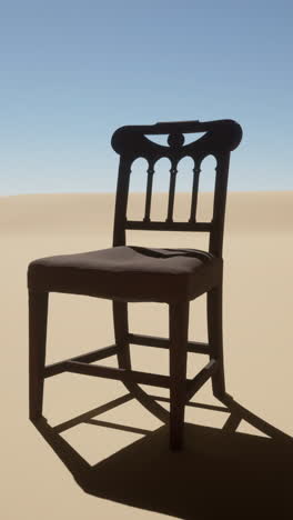 a wooden chair in a desert