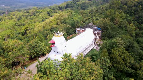 Random-huge-chicken-church-temple-on-Rhema-forested-hill-in-Yogyakarta,-Indonesia