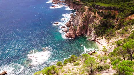 sandstone cliffs of tossa de mar town at mediterranean sea, costa brava, catalonia, spain