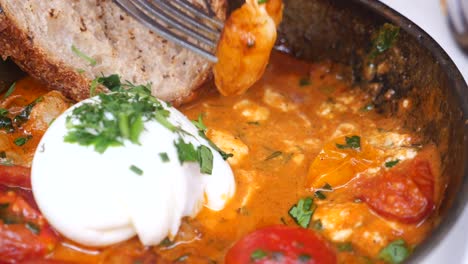 greek breakfast bowl with eggs and toast