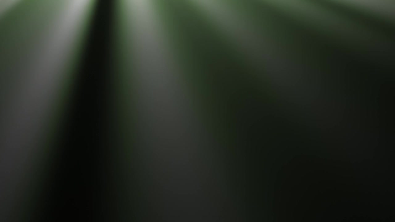 Animated Volumetric Light Rays Moving on a Dark Background