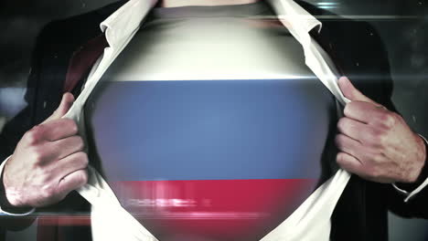 businessman opening shirt to reveal russian flag