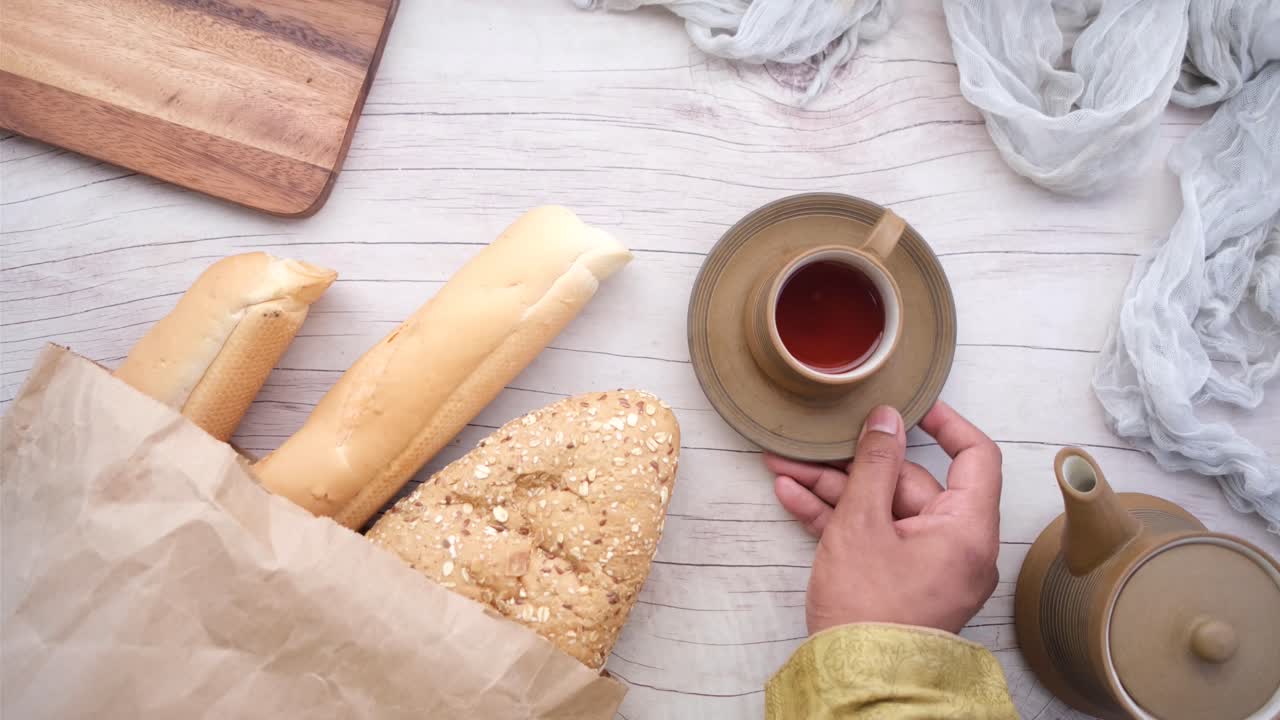 Breakfast Scene with Bread and Tea