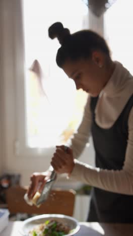 woman preparing a cheese dish