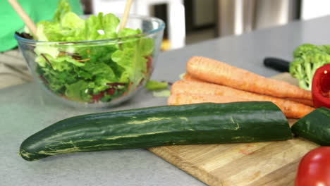 Close-up-on-father-and-son-cooking-vegetables