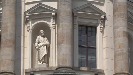 medium shot of facade of french cathedral of friedrichstadt at gendarmenmarkt, französischer dom, berlin, germany