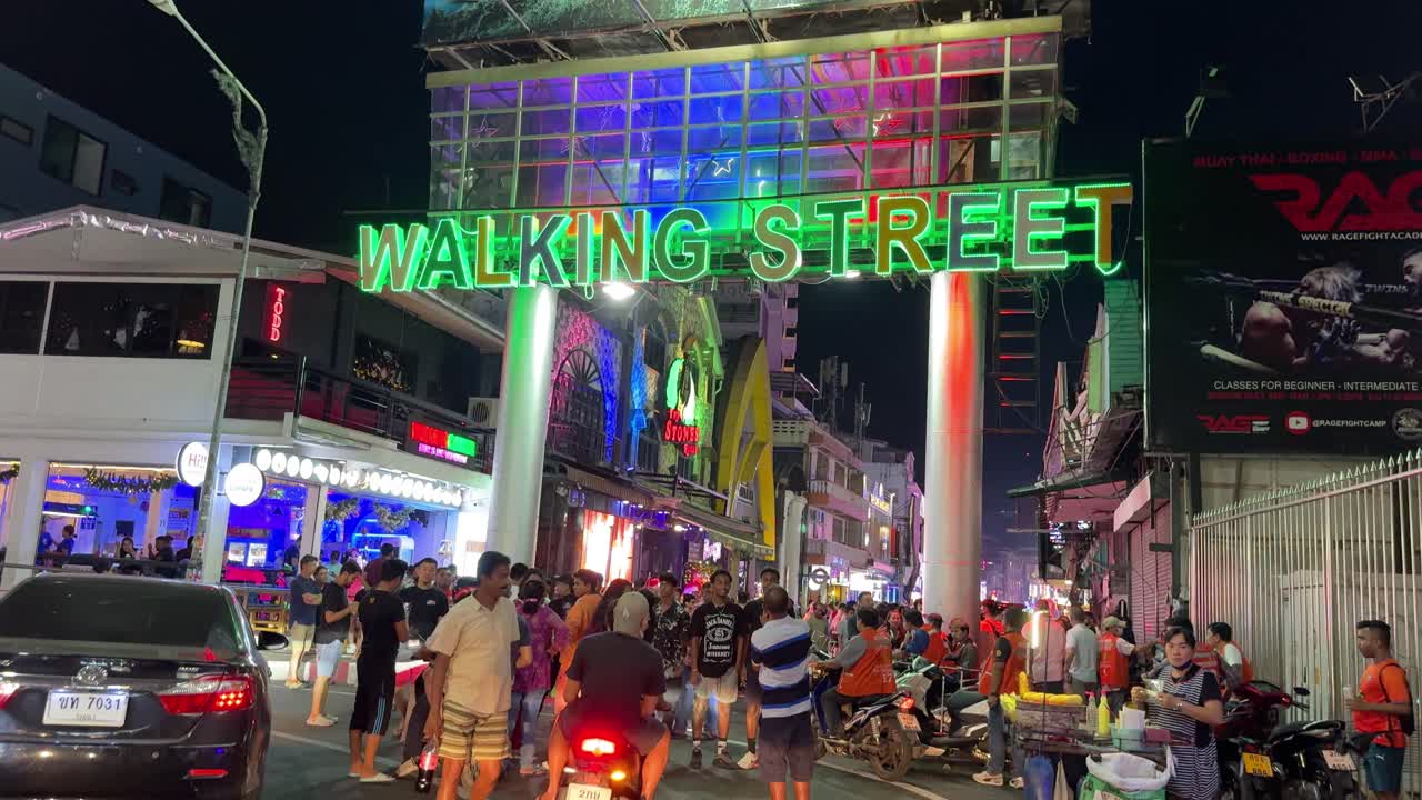 Pattaya Walking street sign at night, busy nightlife party at night disco