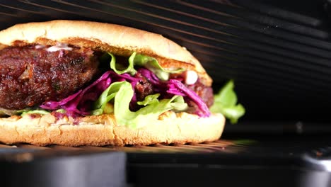 a delicious burger being grilled