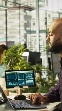 vertical video accountant in office giving report files to coworkers