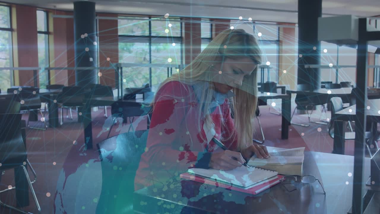 Woman consulting open book writing notes while animated map overlay with data nodes guiding study