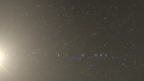 animación del destello de la lente sobre puntos blancos contra un fondo negro.