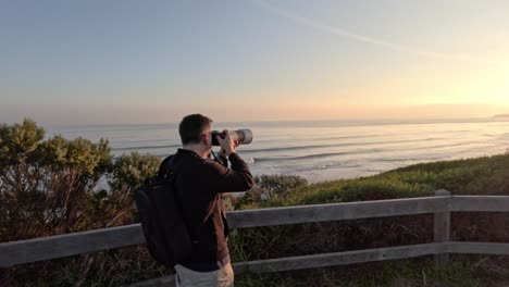 man photographing sunset at point nepean, melbourne