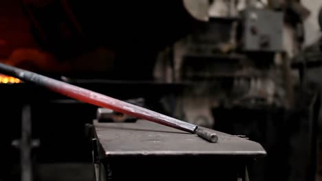 Blacksmith-working-on-molten-metal-4k