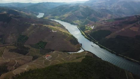 beautiful high aerial footage of the douro river valley in portugal near porto