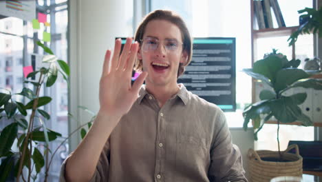 a man holding a phone indoors
