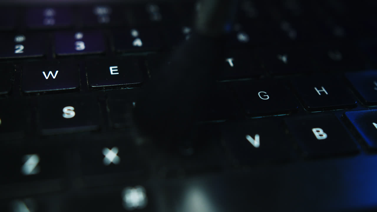 Close-up of a Dark Laptop Keyboard