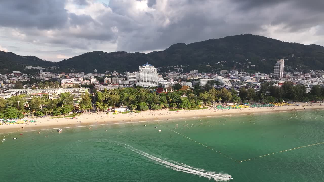 Patong cityscape with long beach, travel destination in Phuket, Thailand.