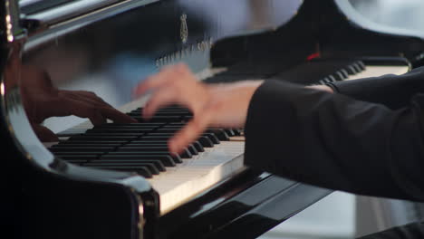 pianist playing a steinway piano