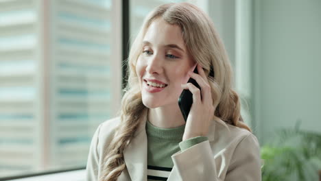 businesswoman on a phone call in the office