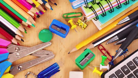 school supplies on a wood background