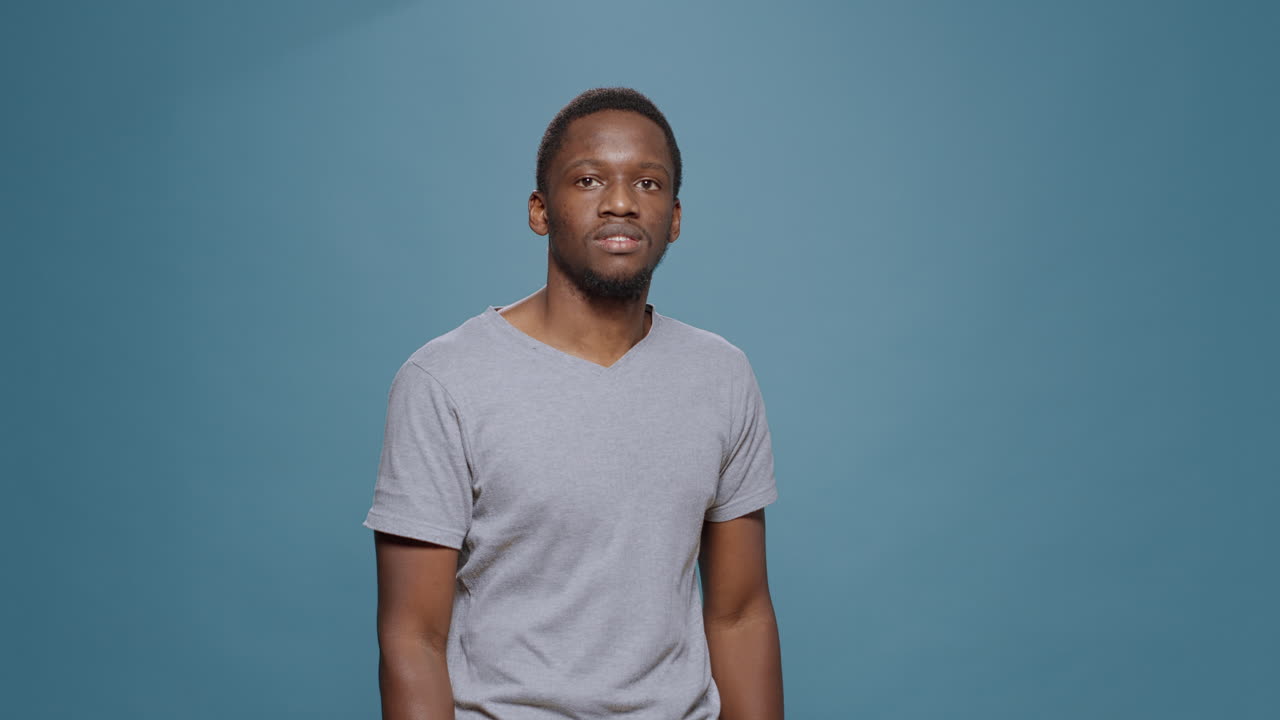 Portrait of african american man posing with arms crossed