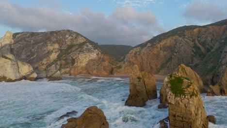 Steep-rocks-and-cliffs-in-the-Atlantic-coast-of-Ursa-Beach-in-Portugal