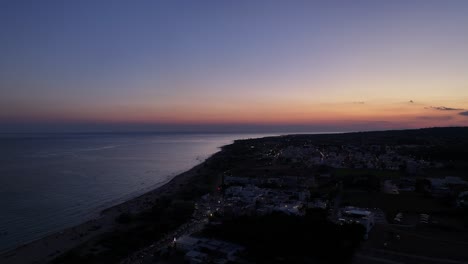 breathtaking 4k aerial sunset over the sea, with vibrant colors painting the sky and water
