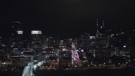 sideview aerial of skyskrappers in nashville, tennesse at night