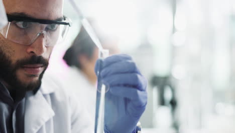 scientists conducting experiment in lab