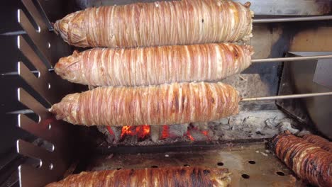 turkish köfte (meatballs) cooking on charcoal