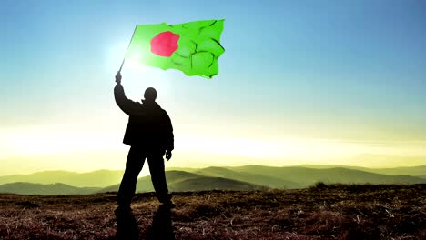 successful silhouette man winner waving bangladesh flag on top of the mountain peak. cinemagraph loop background
