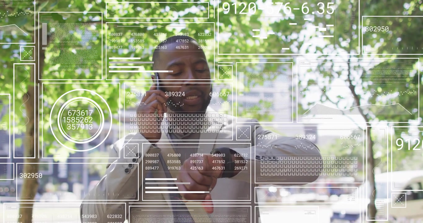 Businessman taking phone call and tapping smartwatch showing transparent overlay with tech metrics