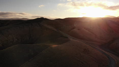 4K-Drone-shot-over-mountains-or-dunes-in-New-Zealand-during-sunset