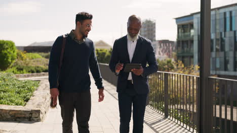 walking, outdoor and business people with tablet