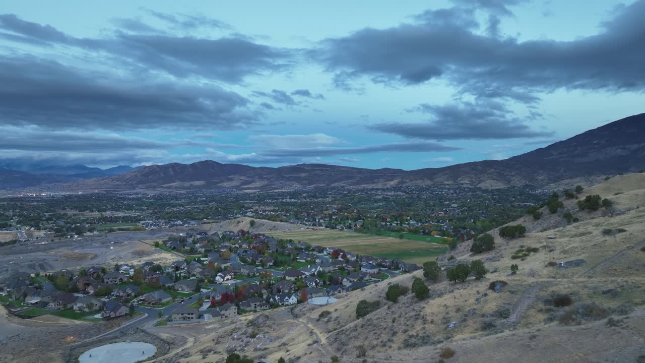 Aerial Flyover Of A Mountain Landscape Revealing The City Of Alpine At Dawn In Utah, USA