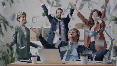 Team Celebrating Success with Money Rain