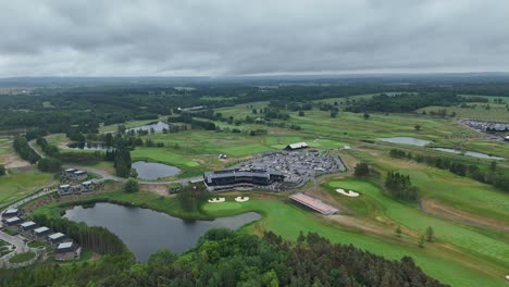 drone of tpc toronto fairways and water hazards under bright summer sky