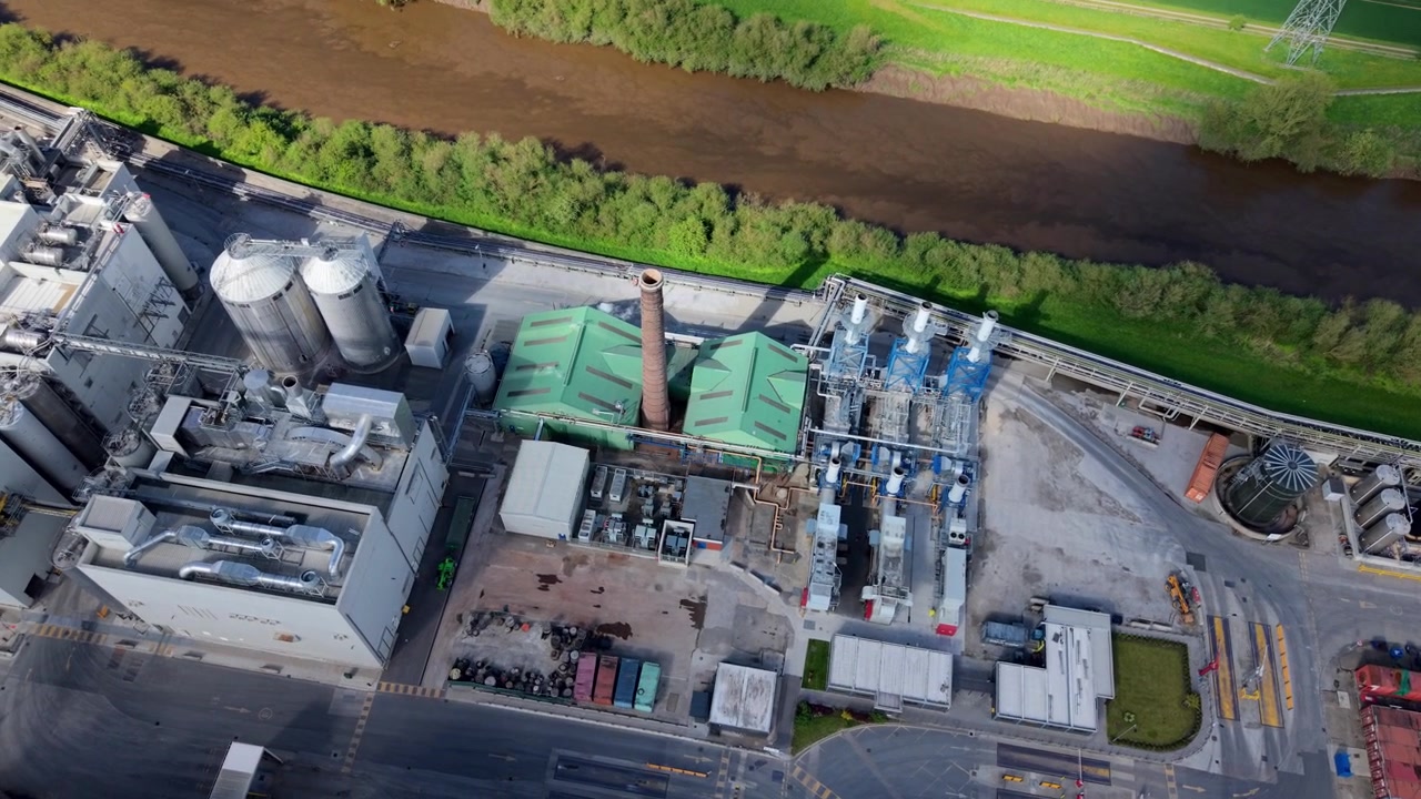 Industrial Food Plant and Tall Silo Tanks in Selby UK Drone Flyover Shot