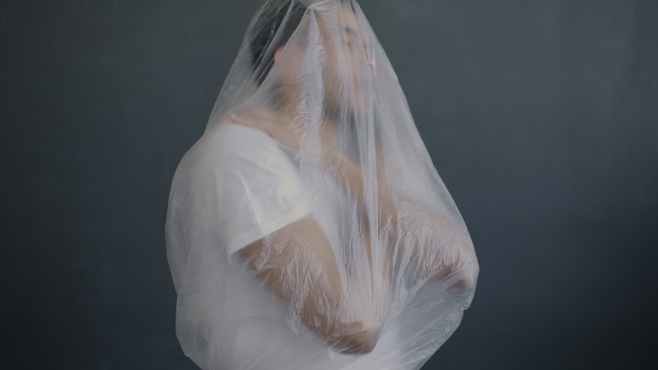 A Person Suffocated by Plastic