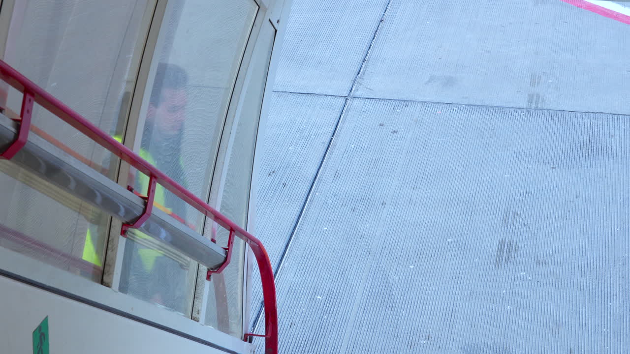 Airport worker on stairs